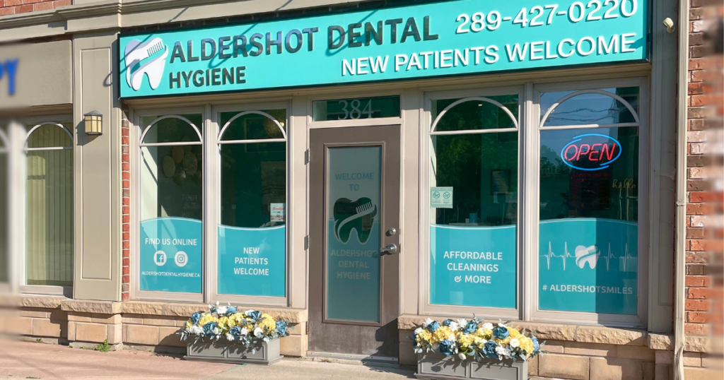 Vibrant floral display in front of Aldershot Dental Hygiene featuring a variety of colourful flowers arranged in neat beds. The new addition enhances the streetscape and contributes to the beautification of Plains Road